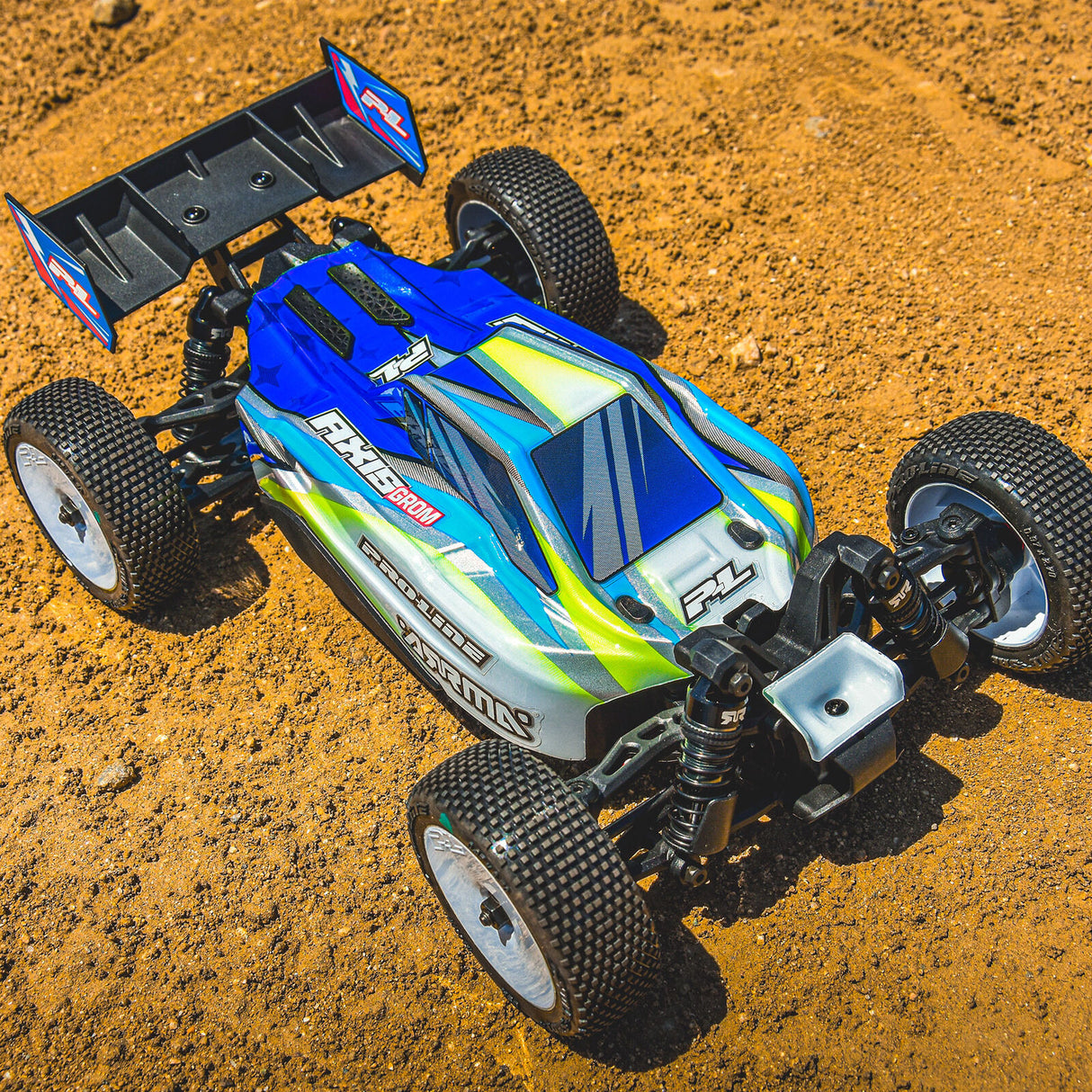 Pro-line Racing PRO367121 Limited Edition 1/14 Pre-Cut/Pre-Painted Axis Jagged (White/Blue) Body: Typhon GROM