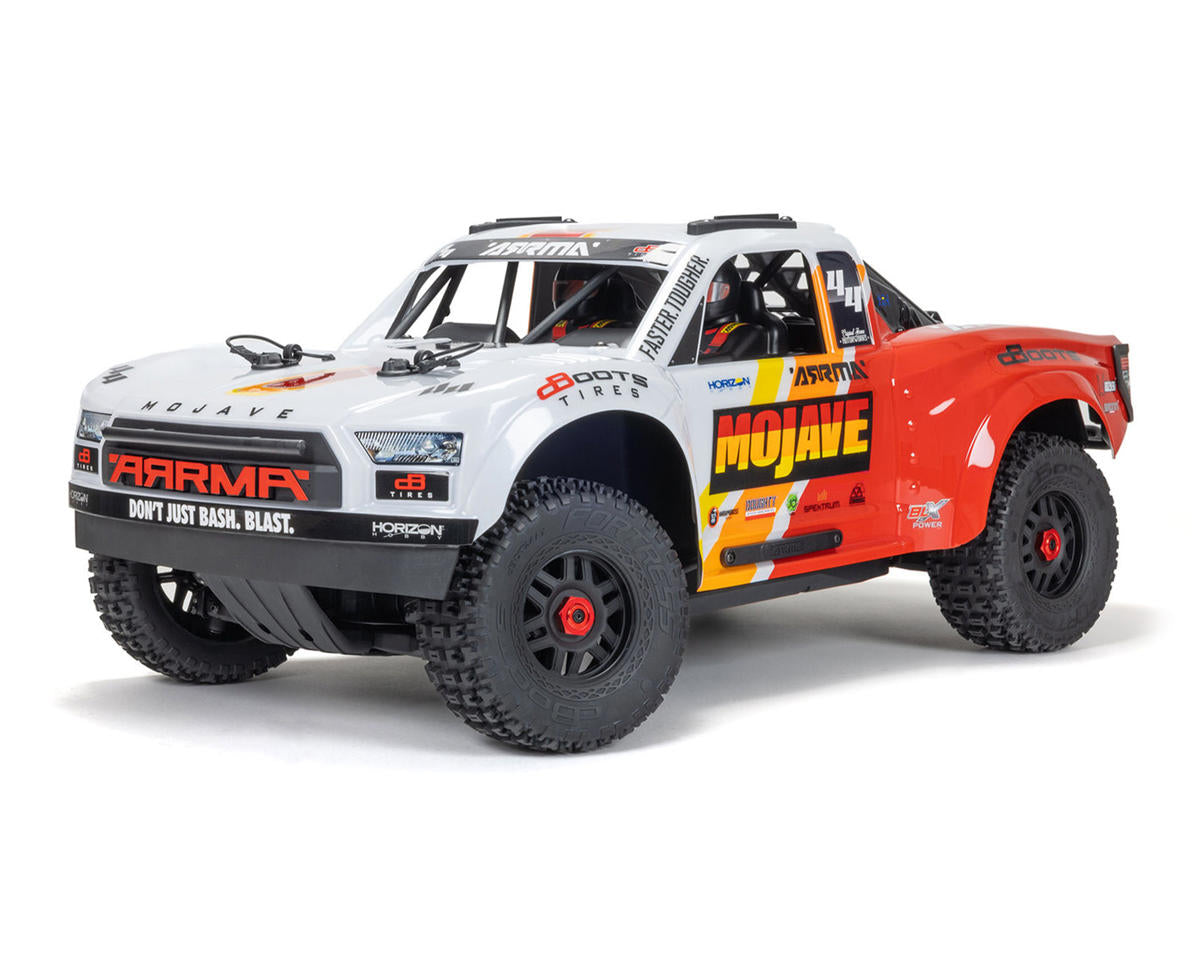 Arrma ARA4404T1 MOJAVE 4S BLX Brushless 1/8 4WD RTR Electric Desert Truck (blanc/rouge) avec radio Spektrum SLT3 2,4 GHz