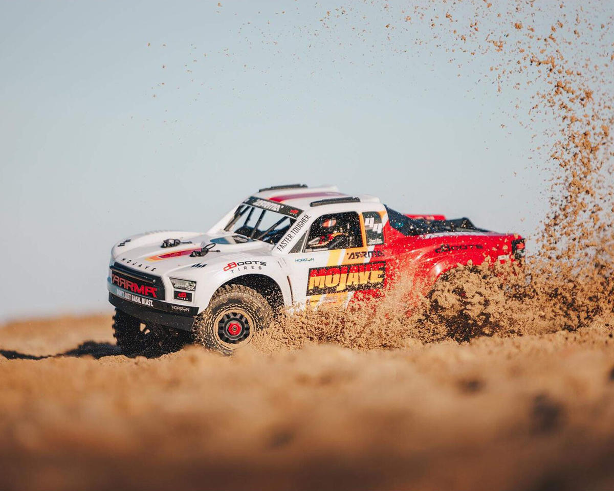 Arrma ARA4404T1 MOJAVE 4S BLX Brushless 1/8 4WD RTR Electric Desert Truck (blanc/rouge) avec radio Spektrum SLT3 2,4 GHz