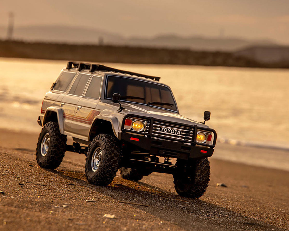 Kyosho KYO34801T1 KC10 Toyota Land Cruiser 60 1/10 4WD ReadySet Brushed Rock Crawler (Silver) w/Syncro KT-231P+ 2.4GHz Radio