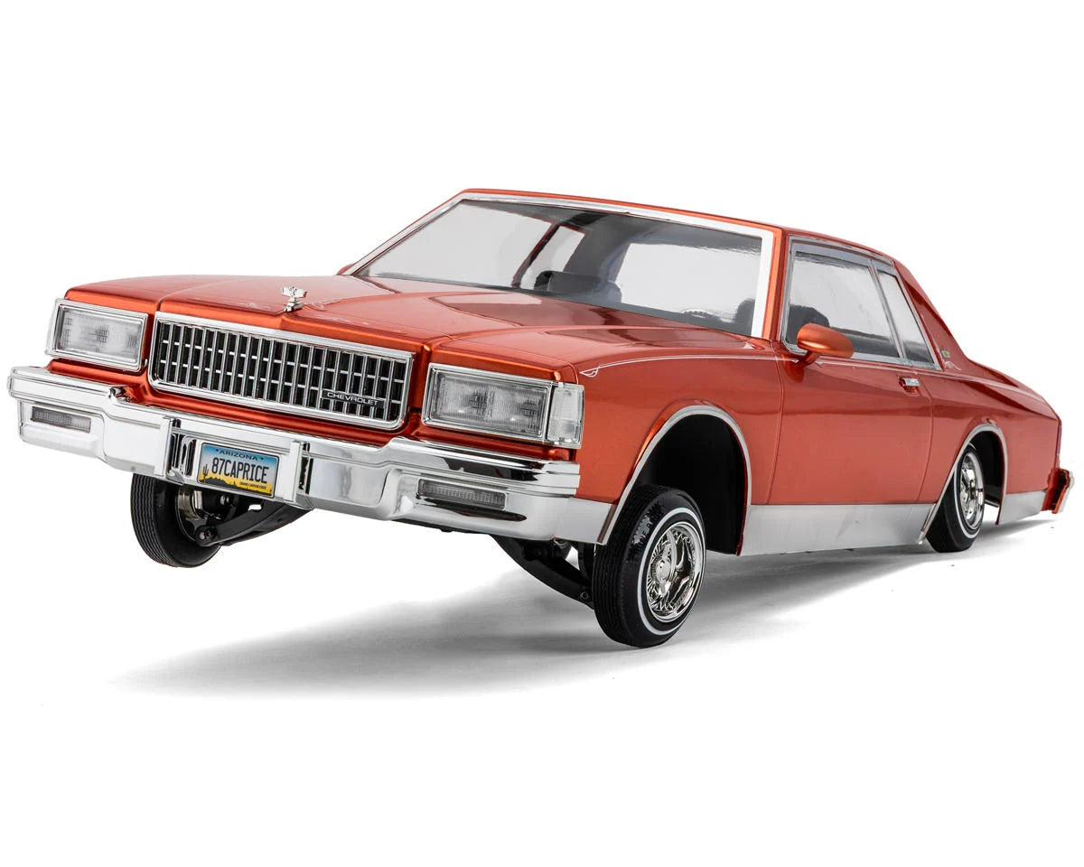Redcat RER40284 1987 Chevrolet Caprice 1/10 RTR Scale Hopping Lowrider (Orange) w/2.4GHz Radio, Battery & Charger