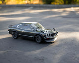 Kyosho KYO34428T1 Fazer Mk2 FZ02 72' Mazda Savanna RX-3 Electric 4WD 1/10 RTR Touring Car w/Syncro KT-231P 2.4GHz Radio