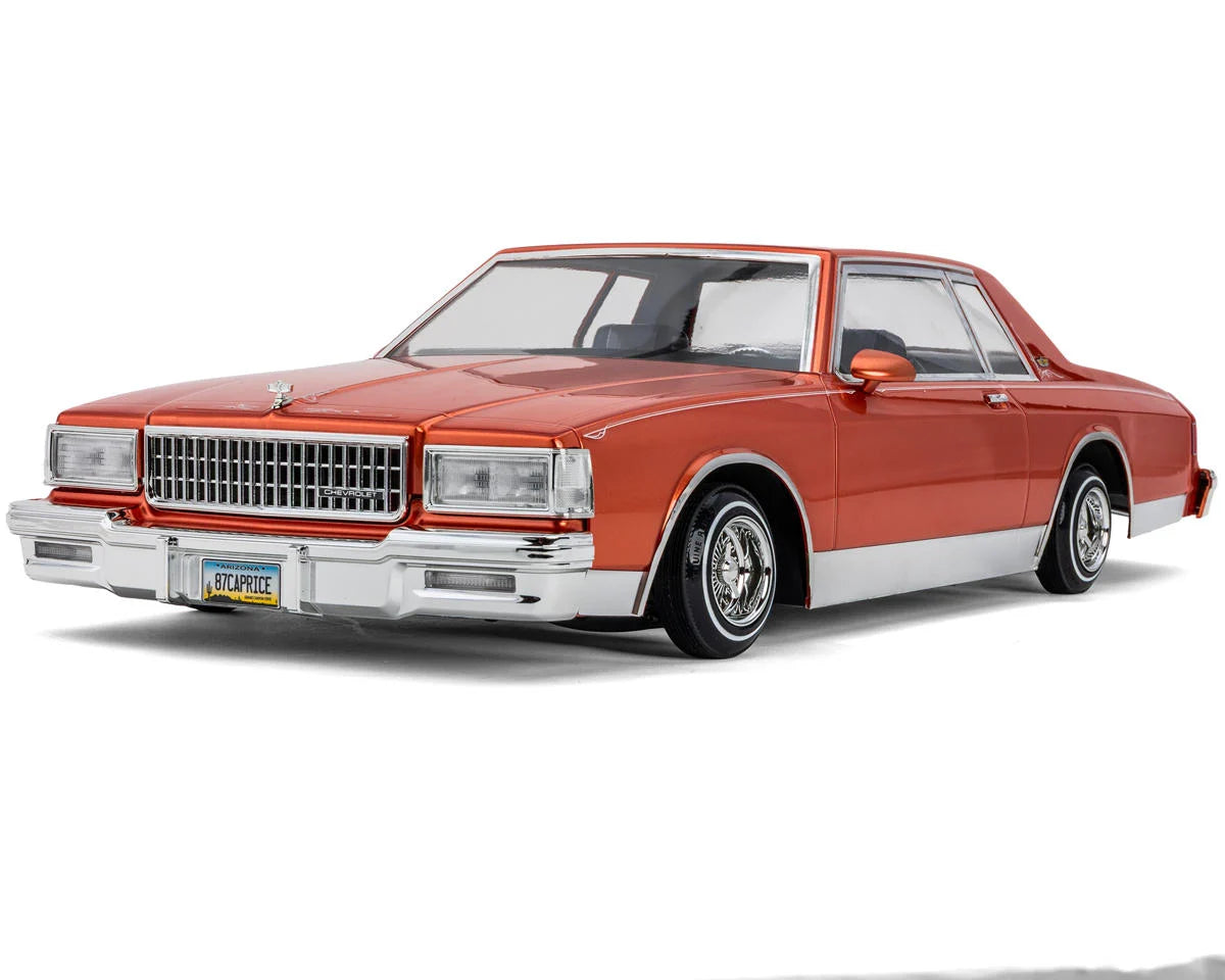 Redcat RER40284 1987 Chevrolet Caprice 1/10 RTR Scale Hopping Lowrider (Orange) w/2.4GHz Radio, Battery & Charger