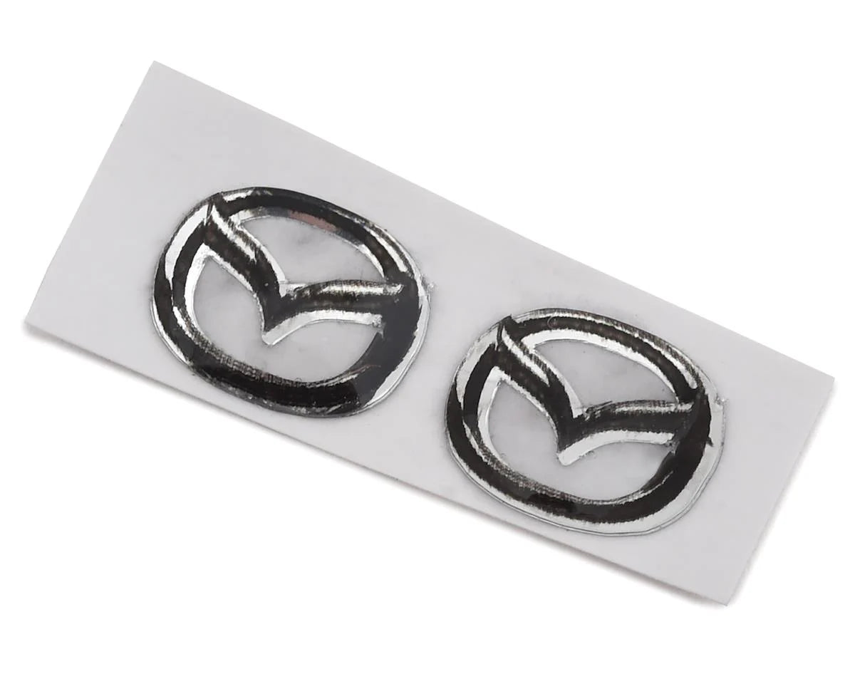 Sideways RC Nissan Badges (2) (Miniature Scale Accessory)