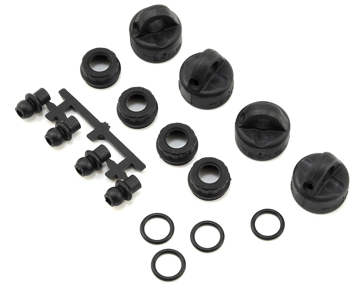 Tekno RC TKR6712 EB410/ET410 Shock/Cartridge Cap & Bushing Set (4)